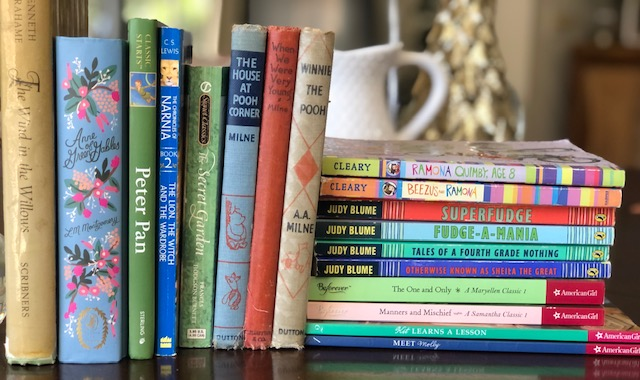A stack of antique books that can be great for homeschooling