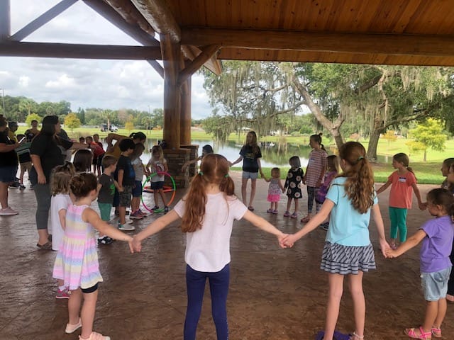 Group of children taking part in a homeschool game at a homeschool co-op gathering