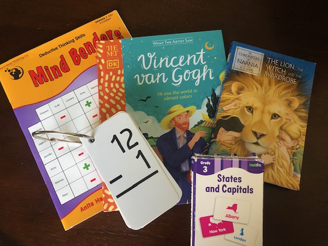 Flashcards and books as part of a homeschool morning basket