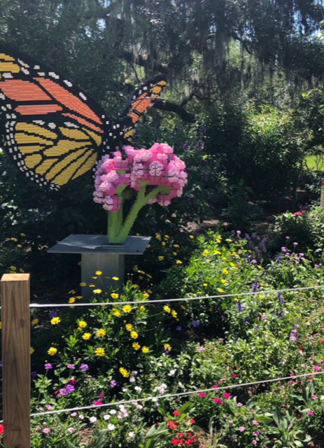 Large butterfly statue in garden